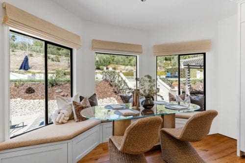 Worldly heritage transitional breakfast nook by JRP Design and Remodel in Westlake Village