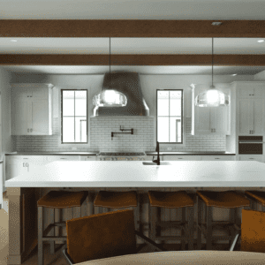 A modern farmhouse kitchen with white cabinetry, a large island, stainless steel appliances, and barstools. Pendant lights hang over the island, and natural light pours in through windows.