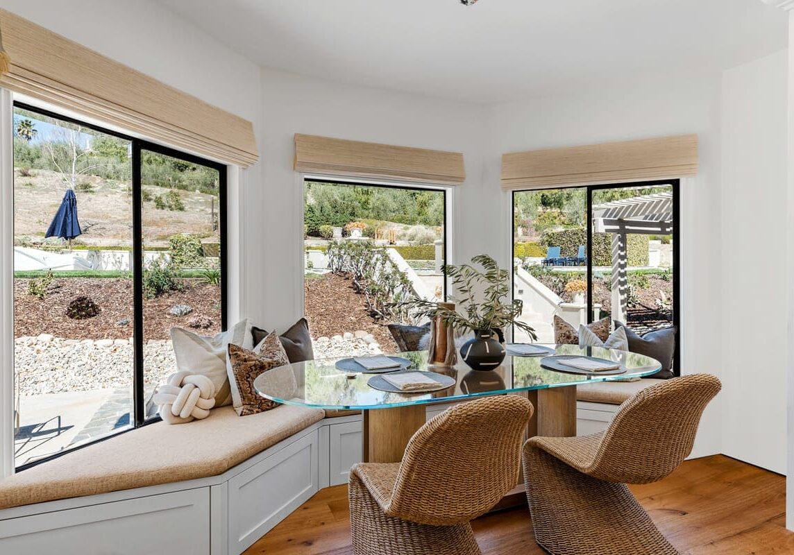 Worldly heritage transitional breakfast nook by JRP Design and Remodel in Westlake Village